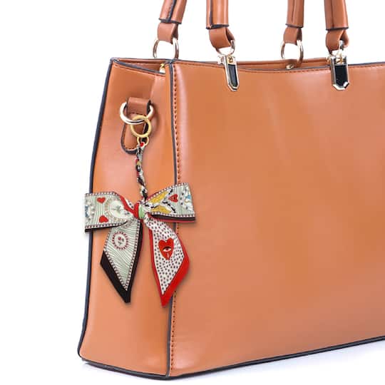 Blue Moon Studio™ Red Hearts & Bees Print Bow Bag Charm